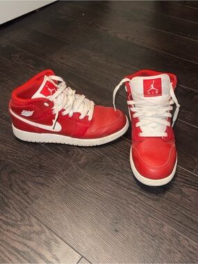 Women’s Air Jordan 1 Red and White Mid-Top Sneakers